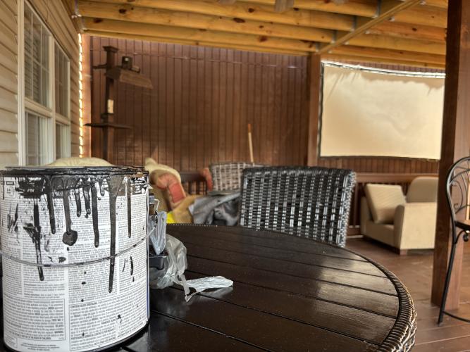 A can of paint sits on a table on the patio of Wright's Southern Cafe. Brittanie Wright, the owner of the restaurant, and her family have added a fresh coat of paint to the building as they prepare for their grand opening on Sept. 26. (Maura Potvin/The Oglethorpe Echo)