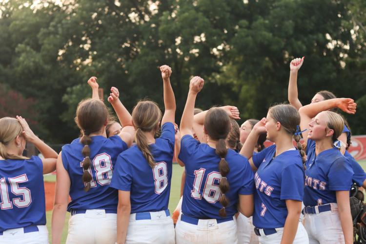 The Oglethorpe County High School softball team breaks down their after game cheer at the Clarke Central high school on Wednesday, Sept. 2, 2026. The Patriots beat Clarke Central 12-1 during its makeup game. (Photo/Sydney Jarrard)