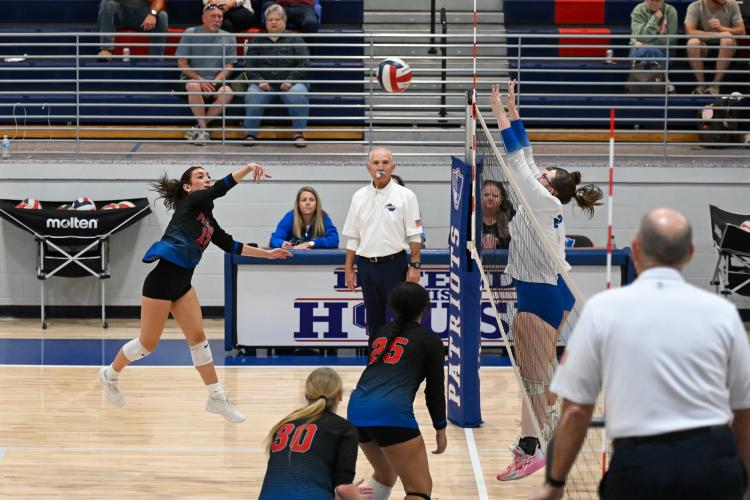 OCHS senior Nora Turner strikes the ball against Fannin County in the Sweet 16 of the Class A/AA playoffs on Tuesday. Turner had six kills in the 3-0 victory (Photo/Will Hearn).