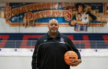 Larry Brown, who played both football and basketball at the University of Georgia and played a year in the NFL, is in his first season as the coach of the Oglethorpe County boys team. "As for basketball, I just want to build a first-class program," Brown said. (Photo/Sarah White)