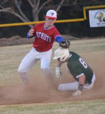 Senior SS Landon Eberhart tags an Athens Academy runner in the Patriots’ 7-0 victory last week. The Patriots are off to a 5-0 start and are ranked 10th in the Georgia Coaches Class AA poll. (Ralph Maxwell/Submitted Photo)