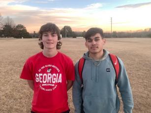 From left to right, freshman striker Hudson Stepp and senior goalkeeper Christian Palma. Photo taken after practice before their first Home match against Athens Christian Academy.  (Kaylah House/ The Oglethorpe Echo)
