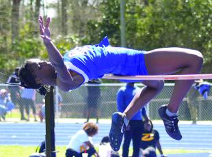 Kenzie Henderson set her personal best with a high jump of 5 feet, 7 inches at the Loch Johnson Relays on Saturday. Submitted photo