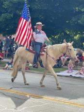 Ruth Wilson is pictured leading the 2022 Winterville Marigold Festival Parade. She is on her parade horse, "Major." (Photo/ Ruth Wilson)