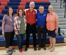 Eric Schmidt (center) stands with four students from his first year of teaching last week. All four (from left): Wanda Colquitt, Brenda McCormack, Schmidt, Tim Poole and Andrea Ash work with Oglethorpe County Schools. (SUBMITTED PHOTO)