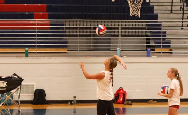OCHS sophomore Elizabeth Cook serves during practice earlier this season. Cook had five kills in victories over Prince Avenue Christian School and George Walton on Tuesday. (LANDEN TODD/THE OGLETHORPE ECHO)