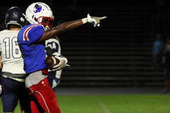 Darius Heard signals a first down during Oglethorpe County’s 19-7 victory over West Hall in a football scrimmage on Friday night. Heard will play both defensive back and receiver this season. (LANDEN TODD/THE OGLETHORPE ECHO)