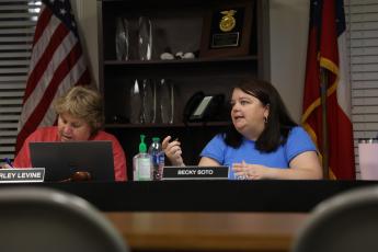 CASSIDY HETTESHEIMER/THE OGLETHORPE ECHO Oglethorpe County School Superintendent Beverley Levine (left) and Becky Soto, chair of the Board of Education, discuss the 2023 Georgia Milestones scores and other business at a meeting on Tuesday night. The Board of Education will host two public hearings about the millage rate on Friday, Sept. 8. 