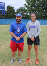 Co-athletic directors Michael Holland (left) and Brianna Dickens were promoted to the position in June, becoming the fifth co-ADs in the past eight years. Holland also is the head football coach and Dickens is the head coach of the girls basketball and softball team. (LAUREN HILL/THE OGLETHORPE ECHO)