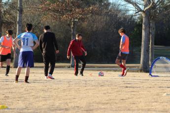 OCHS soccer coach Erich Forschler participates in a drill at practice last week. The Patriots will look to build on last season, when they advanced to the second round of the tournament. (Samuel Higgs/The Oglethorpe Echo)