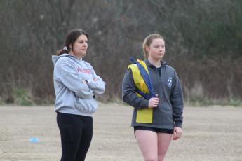 Alex Orlowsky and Taylor Doherty, former OCHS soccer players, now serve as volunteer assistants for coach Erich Forschler. (Samuel Higgs/The Oglethorpe Echo)