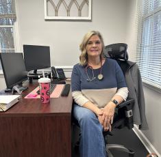 Tina Shehee, nurse practitioner, sits in her office between patients. Shehee works Monday-Friday, with Wednesdays off for 14-hour shifts at Medlink Oglethorpe. (Lily Murphy/Oglethorpe Echo)