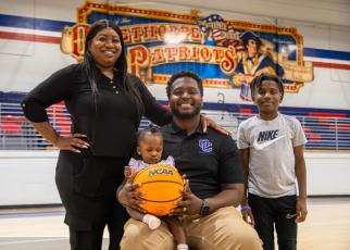 New Oglethorpe County High School boys basketball coach Dayon Toomer, shown with his fiancé Antorya and children Carson and Cionni, was hired on April 28. Toomer's eldest children, Chassity and Mason, aren’t pictured. (Ethan Greene/The Oglethorpe Echo)