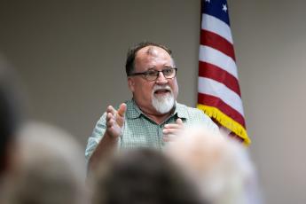 UGA entomologist and Arnoldsville resident Elmer Gray shares tips on how to deal with summer pests, specifically mosquitoes and ticks, at PlowShare's monthly meeting on Monday at the Farm Bureau. The Centers for Disease Control and Prevention has warned of an abnormally early mosquito season. (Ethan Greene/The Oglethorpe Echo)