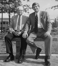 J.W. Fanning (left) and Dink NeSmith sit on a bench in front of the Classic Center that Athens 96 had installed to honor Fanning’s legacy to Athens. NeSmith was chairman of Athens 96. (Submitted Photo)