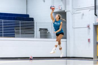 Oglethorpe County outside hitter Leanna Newton serves returns for her junior season after being named MVP of the Class A state championship match last year. She led the region with 425 kills last season. (Ethan Greene/The Oglethorpe Echo)