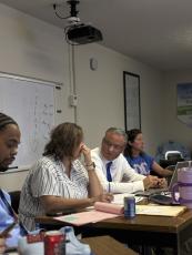 Superintendent Phillip Powell talks with his staff about possibly buying the CommonLit English program at the BOE work session on Aug. 25. The cost of $6,850 was discussed and will be voted on at the next BOE meeting on Sept. 8. (Sophia Bobo/The Oglethorpe Echo).