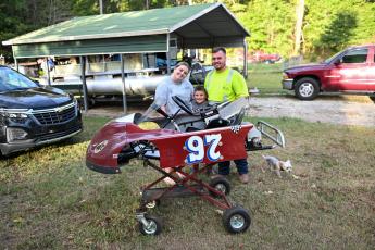 Ansleigh, Carson and Caleb Epps spend time together as a family during Carson’s weekend go-kart races. He has five sponsorships under the name of Carson's Motorsports (Photo/Will Hearn).