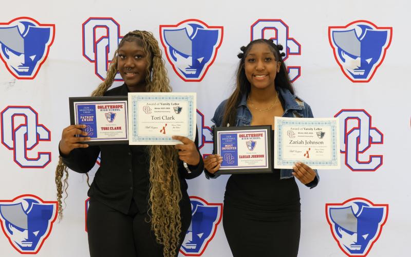 The OCHS cheerleading award winners (from left): Tori Clark (Patriot Award) and Zariah Johnson (Most Improved) at the Oglethorpe County High School winter sports ceremony on March 5. (Addison Simmons/The Oglethorpe Echo)