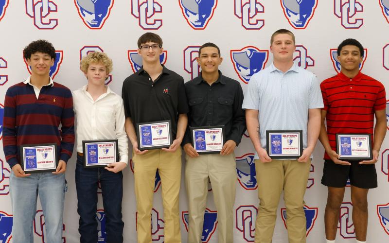 The OCHS boys wrestling award winners (from left): Kendon Brown (Leadership Award), Walker Compton (Iron Patriot Award), Aidan Dellinger (Academic Award), Damien Suarez (Most Improved Wrestler), Tanner Mckie (Patriot Teammate Award) and Keyvon Gresham (Most Outstanding Wrestler). (Addison Simmons/The Oglethorpe Echo)