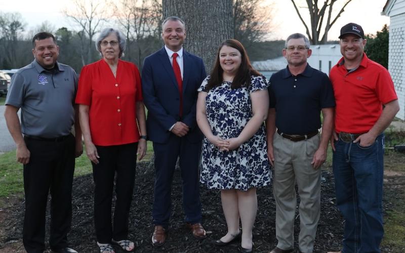 Phillip Powell and the Board of Education pose outside the Oglethorpe County School District on Tuesday, March 10, 2026, in Lexington, Georgia. Powell was announced as the superintendent search finalist and will begin on July 1, pending final contract approval. (Photo/Sydney Shankman)