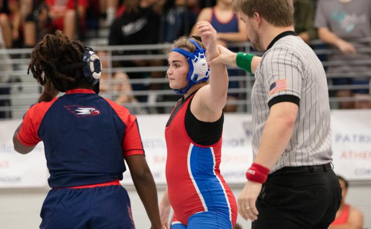 Kayleigh Hilley, who finished second in the state last year, wins a match against Putnam County's Breyesia Farley during Oglethorpe County's 72-18 win on Nov. 18. (Photo/Sarah White)