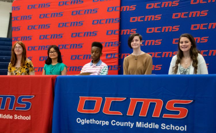 Oglethorpe County Middle School eighth-grade students Lyla Bryant, Ellen Hgay, Ermon Lewis, Devyn Patrick and Madison Rader are the recipients of the REACH scholarship. The REACH program provides a $10,000 scholarship for each selected student. (Photo/Sarah White)