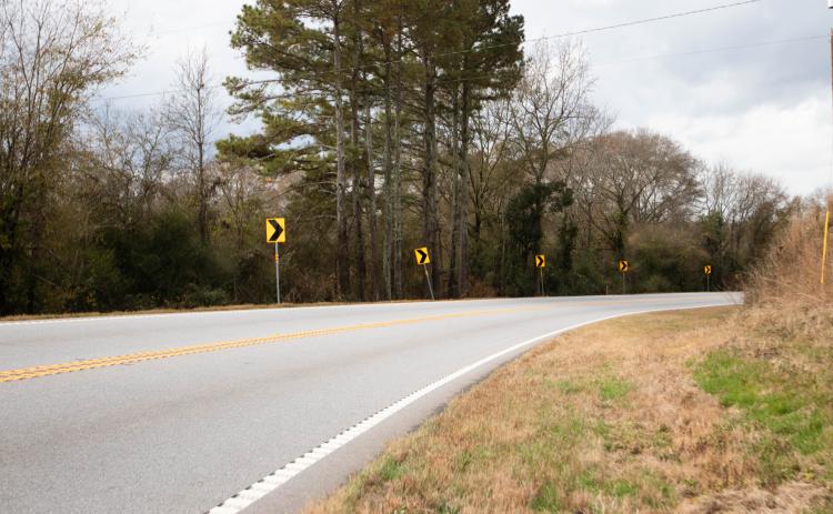 Cherokee Corner is marked by signs showing the direction of the curve. (Photo/Sarah White)