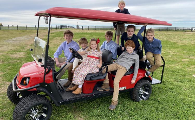 Our eight grandchildren look forward to the family's Thanksgiving gather and Christmas-morning excitement. Posing with Stella NeSmith are, from left, Hayes Wilson, Bayard NeSmith, Wyatt Wilson, Smith Wilson (standing), Fenn NeSmith, William NeSmith and Henry Wilson. (Submitted Photo)