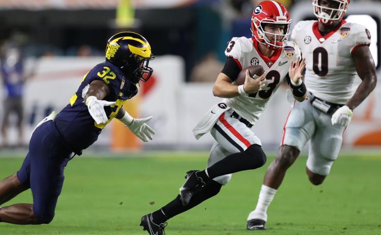 Quarterback Stetson Bennett and a tenacious defense led Georgia to an Orange Bowl victory over Michigan and berth in the CFP national title game. (Submitted Photo/ Tony Walsh, UGA Sports)