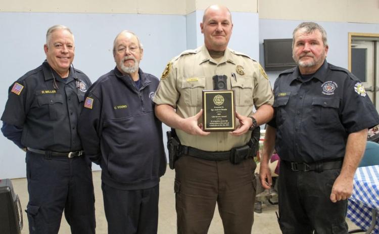 (Submitted Photo/Cody Gibbs) From left to right: Deputy Department Chief Rocky Miller, Department Chief Carl Young, Sgt. Andrew Brooks, Chief Jehu Post.