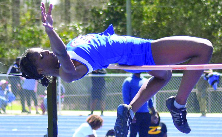 Kenzie Henderson set her personal best with a high jump of 5 feet, 7 inches at the Loch Johnson Relays on Saturday. Submitted photo
