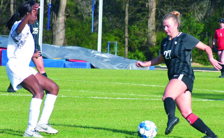 Maddie Williams (right) scored two goals in Oglethorpe County’s 10-0 victory over Glenn Hills to wrap up an undefeated region schedule. (Ralph Maxwell/The Oglethorpe Echo)