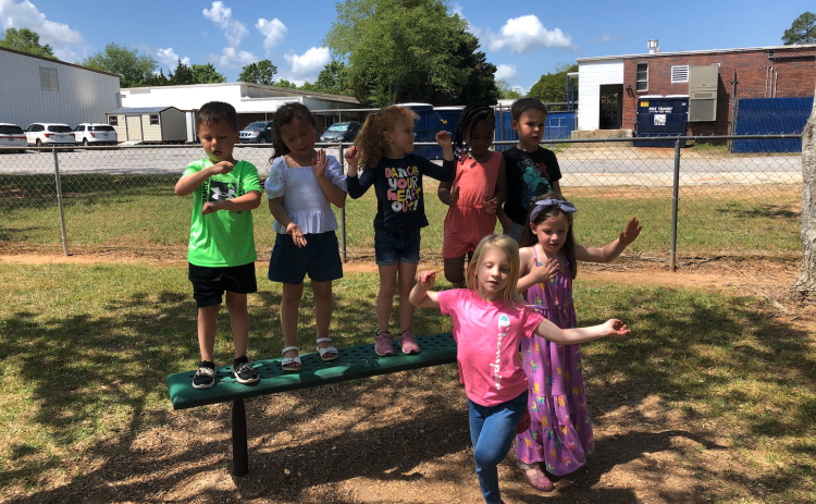 Students enjoy a dance party in pre-K classes taught by Oglethorpe County Primary School’s Andrea Ash and Kelli Kitchen. The students include (on bench, from left): Bennett Owens, Valeria Teran-Jaramillo, Ellie Casper, Laila Bostic and Evan Withers; (front) Kaylee Westmoreland and Caroline Parham. (Submitted Photo)