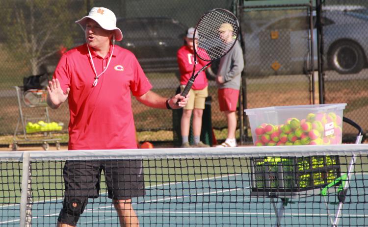 Lloyd Martin preps his youth class before beginning backhand drills. Martin hopes to spark tennis programs in Oglethorpe County. (Armani Kardar/The Oglethorpe Echo)