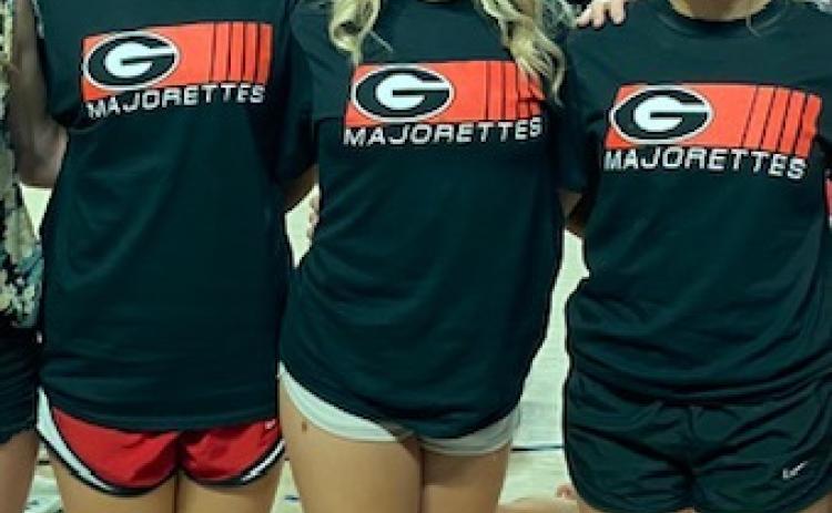 Oglethorpe County High School grads Addie Dellinger (left) and Carrie Tweedell (center), and OCHS senior Emily Graham (right), were recently chosen for the UGA majorettes for this fall. (Submitted Photo)