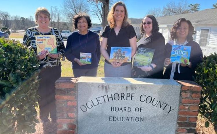 Superintendent Beverley Levine (from left), Gamma Tau member Linda Banks, science instructional coach Jennifer Yauck, English-Language arts department head Elaine Kitchens and assistant superintendent Kanya Cornish celebrate the progress of Dolly Parton’s Imagination Library. (Submitted Photo)