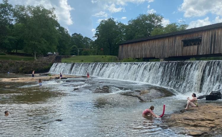 Folks headed to Watson Mill State Park to hit the water and help keep cool on Memorial Day. This is the time to year to make sure your loved ones know how to swim. (Photo/Dink NeSmith)