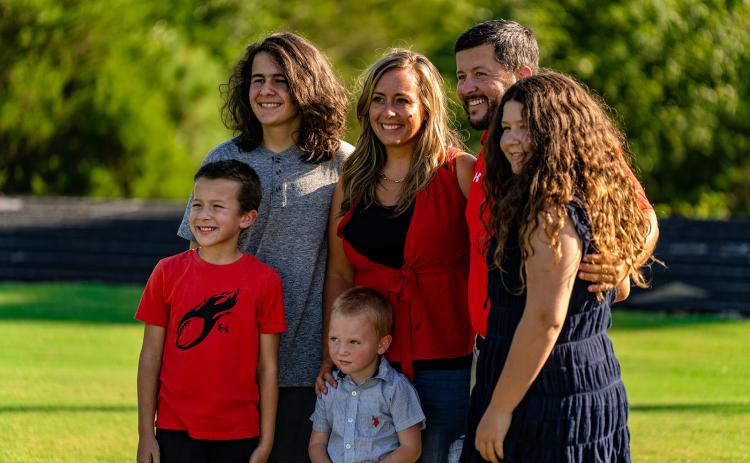 Oglethorpe County football coach Mike Holland with his wife Jessica and their children Kingston, Khalissa, Korbin, and Kamden. (Photo/Jack Casey)