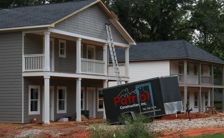 (AISHA SCHULZ/THE OGLETHORPE ECHO) The first two duplexes were built by Patriot Construction at the Crawford Village development site in Crawford. Both duplexes are in the drywall stage and should be ready to rent by November.
