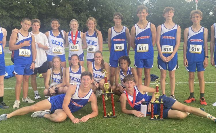 The OCHS cross country teams finished strong at the Patriot Invi- tational XC at Oglethorpe County High School last weekend. The girls won the meet and the boys finished second. (SUBMITTED PHOTO)