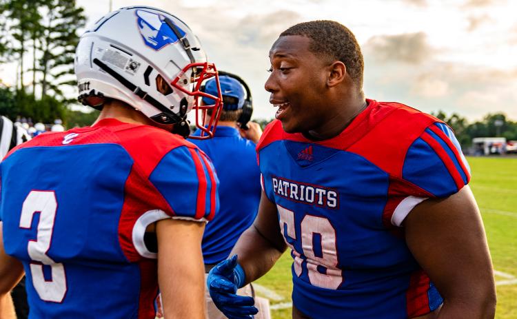 Quarterback Will Sampson (left) and lineman KB Bonds have led Oglethorpe County to a 5-2 record heading into the Region 5-A Division I opener against No. 1 Prince Avenue Christian School on Friday. (Photo/Jack Casey)