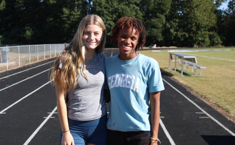 Lizzie Wadsworth (left) and Sydnie Henderson are the top two runners on OCHS's girls cross country team. (De Turner/The Oglethorpe Echo)