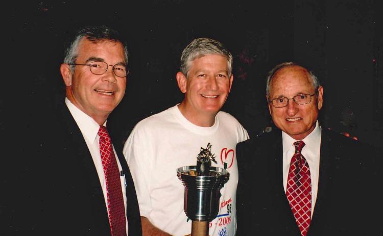 To celebrate the 10th anniversary of the 1996 Olympics, Athens and the University of Georgia re-enacted the torch run. As chairman of Athens 96, I invited Billy Payne, left, and Vince Dooley, right, to speak at the ceremony. (Submitted Photo)