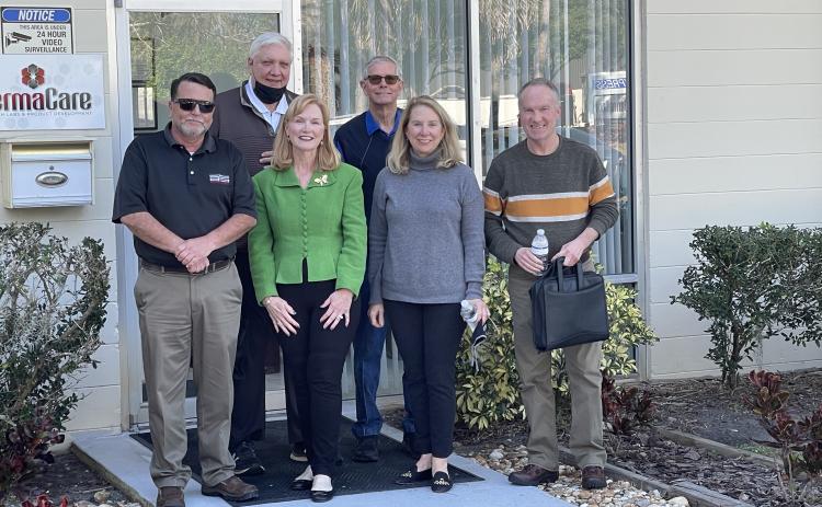 Members of the team involved in the creation and production of  Mirakel visit a testing lab in Daytona Beach, Florida. They include  (back, from left) Skrip Shoppe owner Tim Hansford and Don Chris- tian, and (front, from left) Cole Miller, Marcia Dixon, Ann Hansford  and Tony Gay.