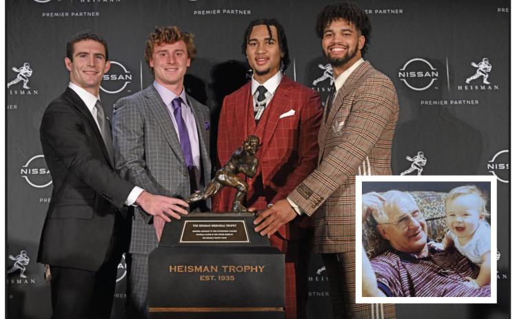 Gridiron savvy is in Stetson Bennett IV’s DNA. Stetson’s grandfather Buddy, holding him in the family photo inset, was a stellar, scrambling quarterback at Jesup High School and the University of South Carolina. Buddy Bennett died in 2016, but he would have loved being in New York to see his grandson honored as one of the four Heisman Trophy finalists. The 2022 honorees are (from left) Bennett, TCU’s Max Duggan, Ohio State’s C.J. Stroud and Southern Cal’s Caleb Williams. (TODD VAN EMST)