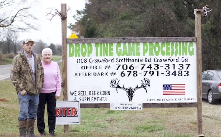 Drop Tine owner Phil Wilson, with his mom Ester Wilson, said damages to his processing facility could cost up to $20,000 to repair. (KYLE SOTO/THE OGLETHORPE ECHO)