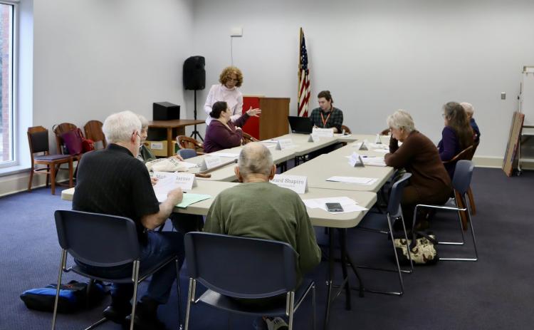 The Oglethorpe County Library Board of Trustees and branch manager Austin Jenkins discussed the library’s finances at its quarter-annual meeting last week. (Photo/Viktoria Kangas)