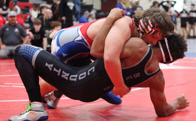 Jacob Spidle finished third at 175 pounds to help the OCHS wrestling team win the Bulldog Bash at Harlem on Saturday. The Patriots head into the Area Duals this weekend. (Photo/Donny Faust)