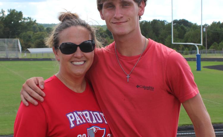 Melissa McGarity coaches the cross country teams, including her son Luke, at Oglethorpe County High School. The winter break helps her recharge for the spring semester. (Maggie Ruland/The Oglethorpe Echo)